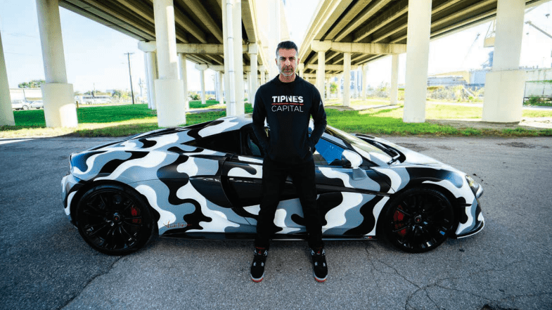 Vick Pitnes next to his Lamborghini