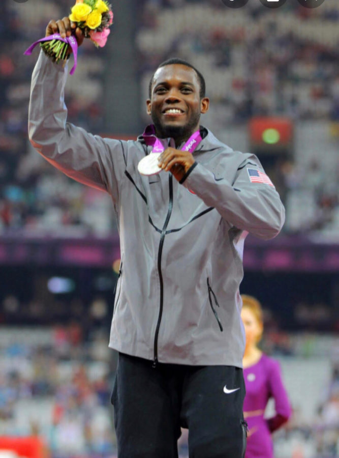 Blake Leeper celebrates winning a medal