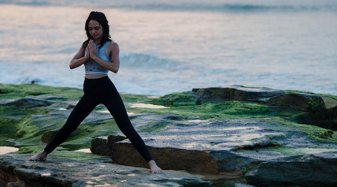 Woman stretching to calm her mind