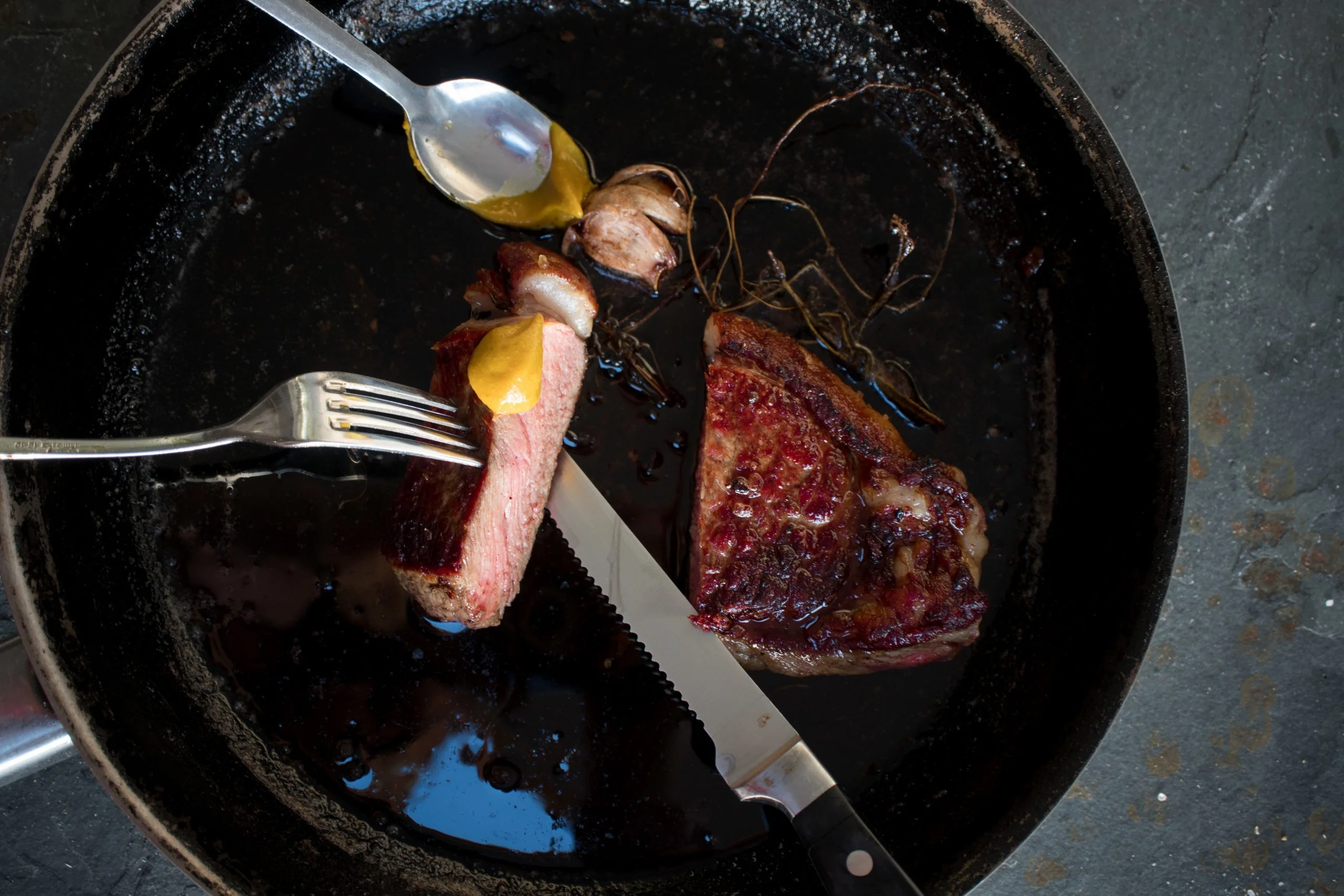 Cooking steak in a pan