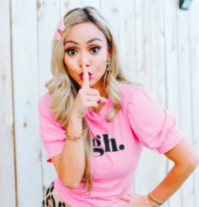 Successful woman wearing pink tshirt