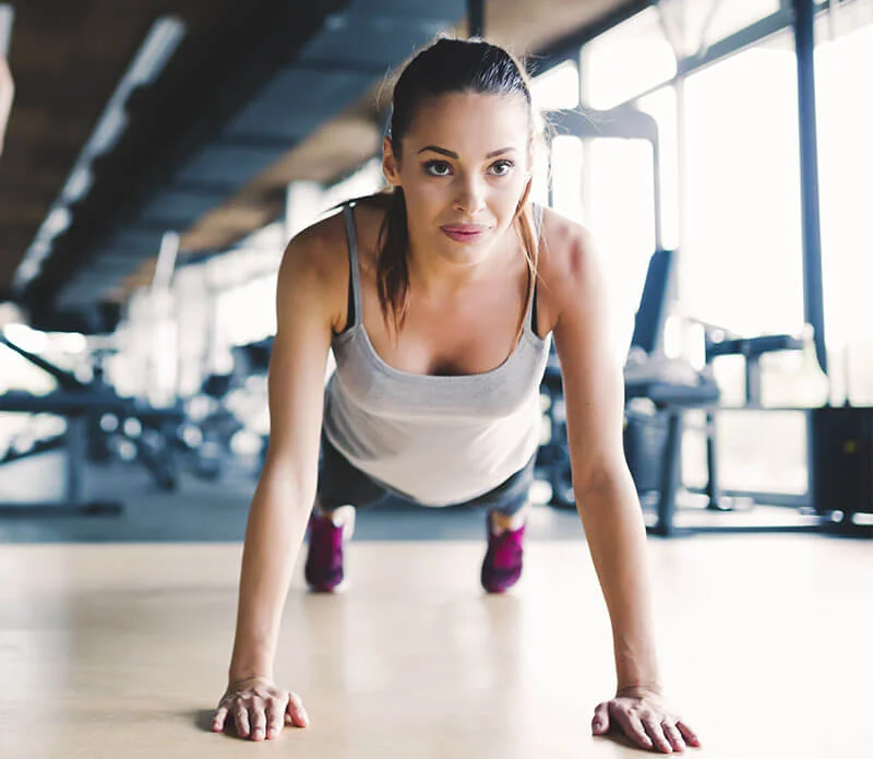 Woman does long lever plank for six pack abs