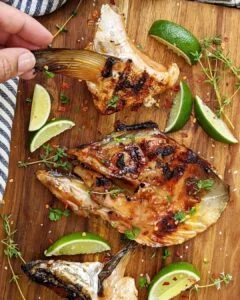 Head of a char grilled Branzino