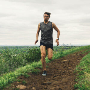 Long distance runner in a field