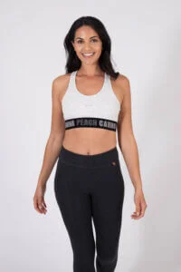 Woman wearing carrot banana beach gym gear