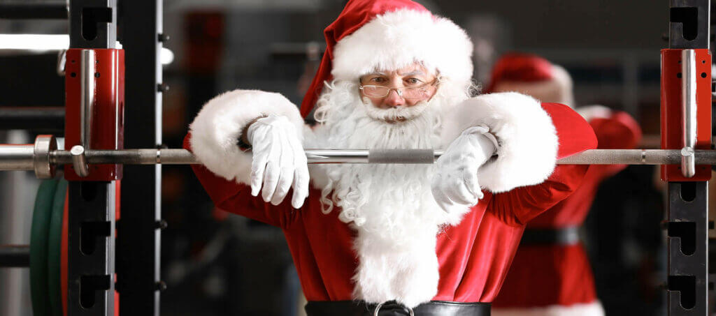 Santa doing his Christmas fitness regime