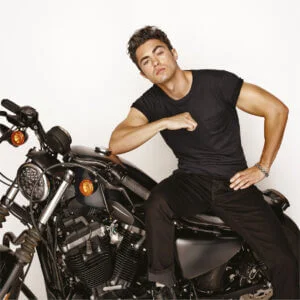 young actor on a motorbike