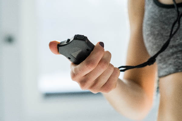 Woman timing a time trial