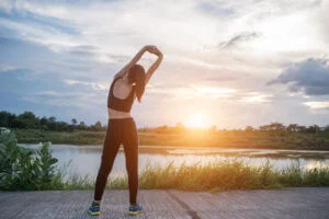 Woman stretching before exercising