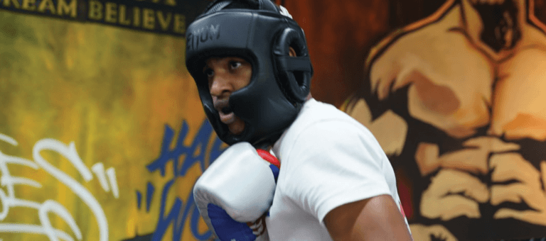 Boxer wearing head guard