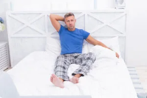 Man relaxing in pajamas