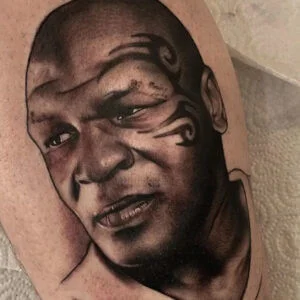 Mike Tyson tattoo on leg