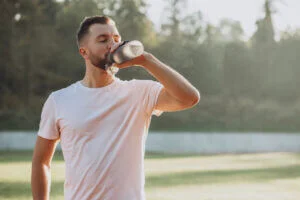 Man drinking a bottle of water