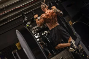 Muscular man doing pull ups