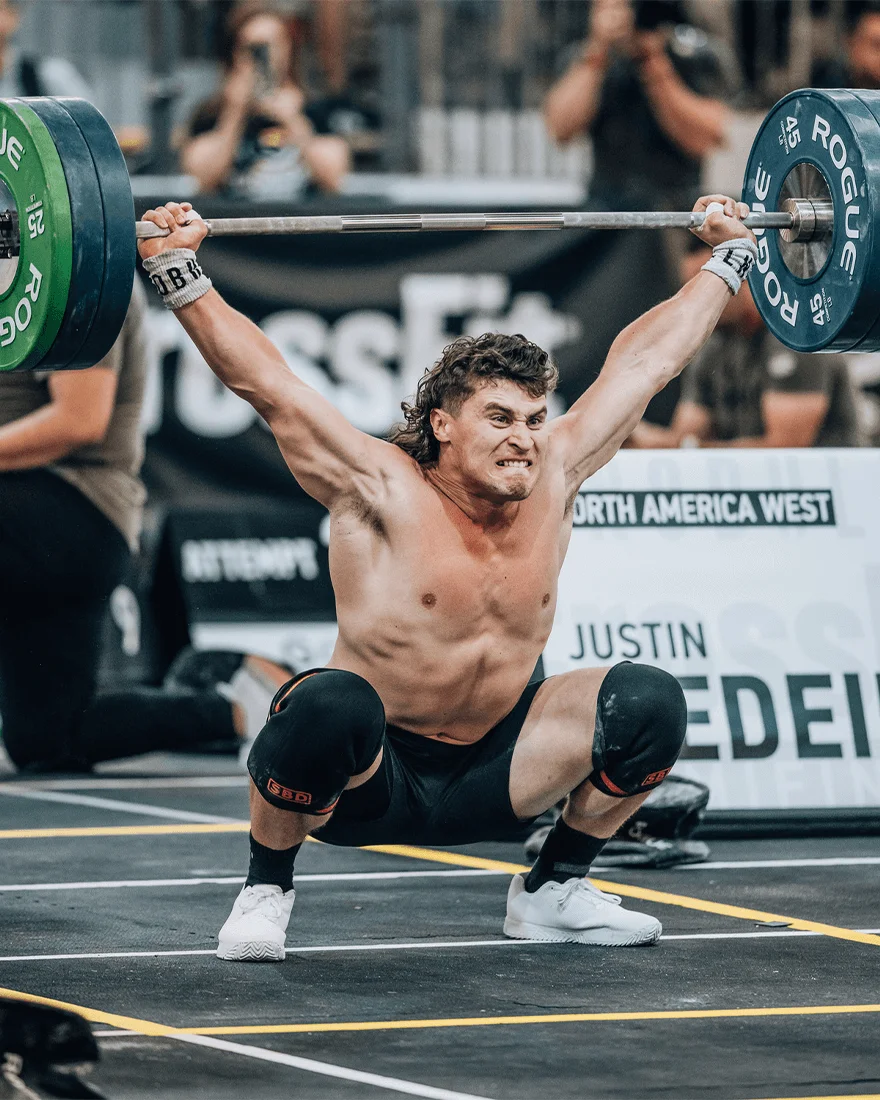 Justin Medeiros lifting weights