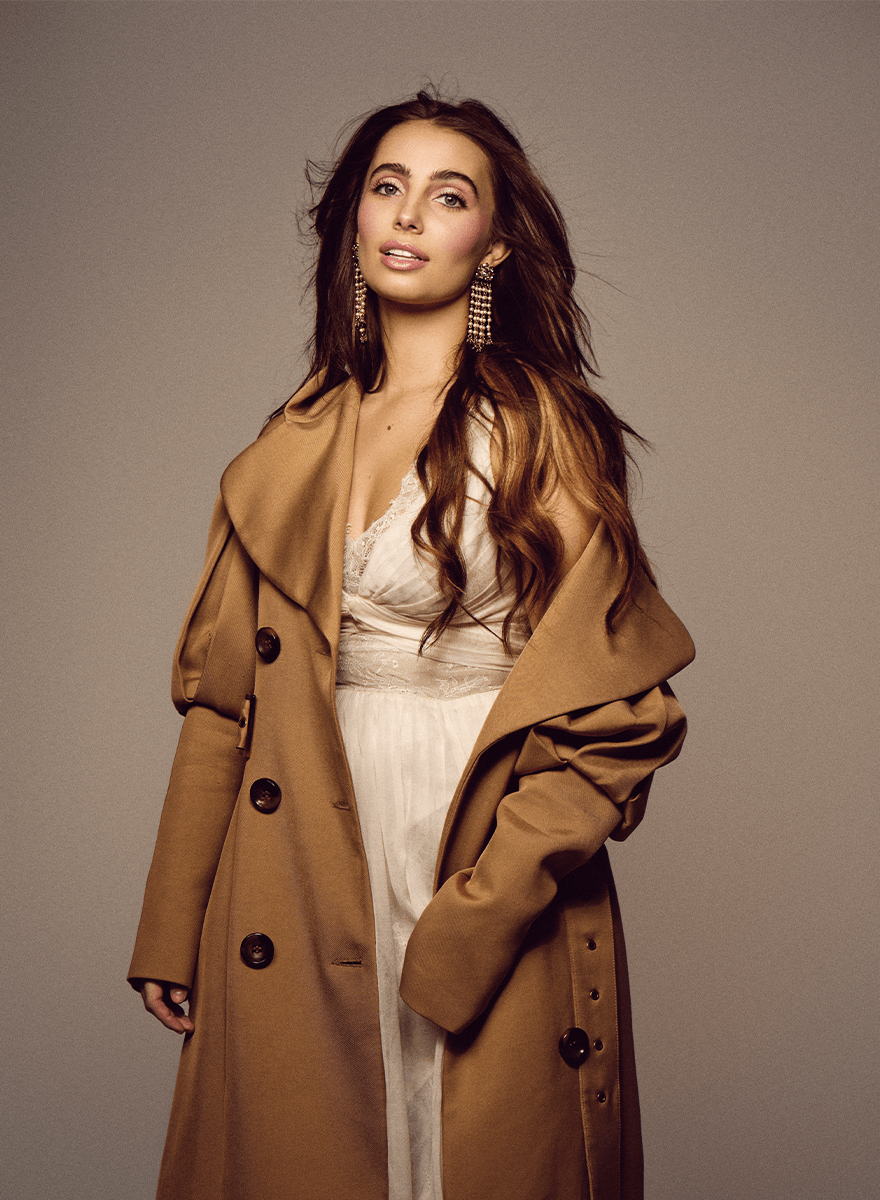 TikTok sensation Lexi wearing a stylish trench coat