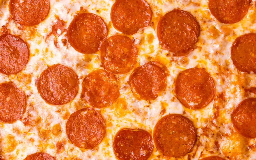 Pepperoni on a pizza