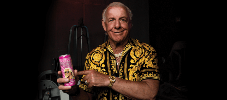 Ric Flare holding his new Wooooo energy drink