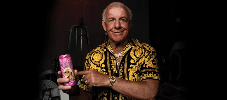 Ric Flare holding his new Wooooo energy drink