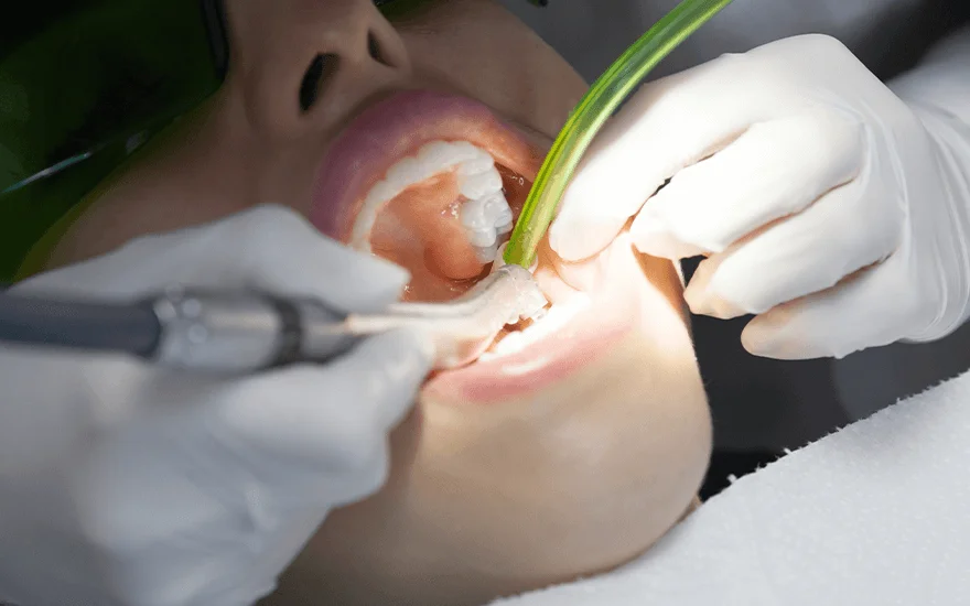 Someone receiving dental treatment in Mexico