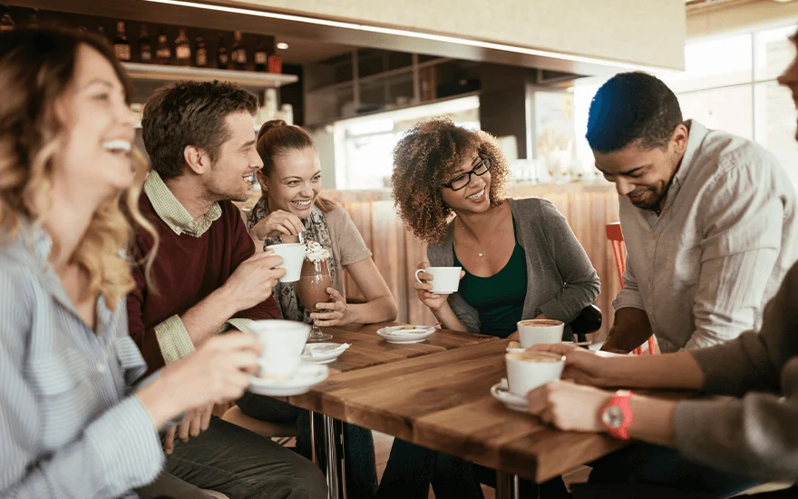 Millennials chat over coffee