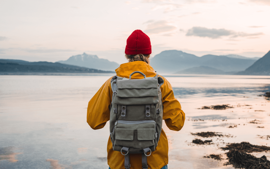 Man walking with his travel essentials