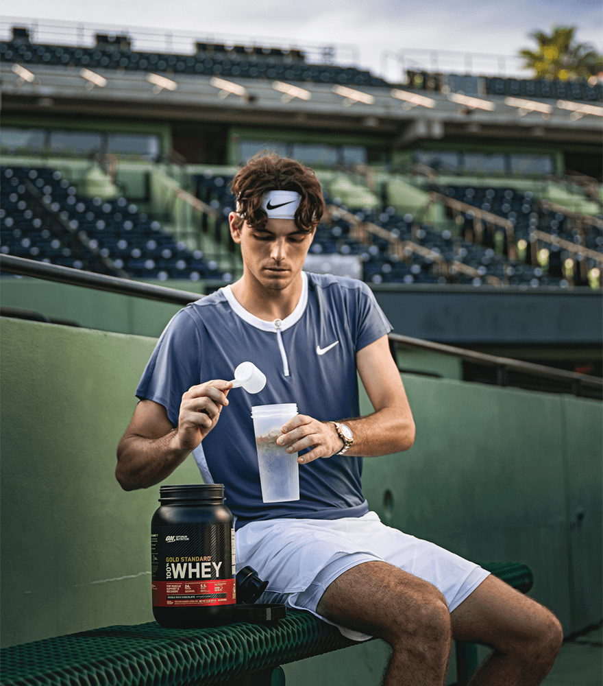 Taylor Fritz making protein shake