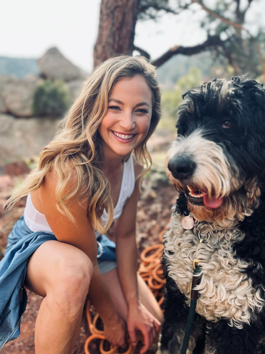 Rockclimber with her dog
