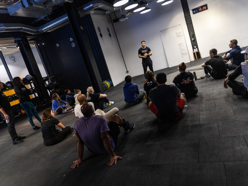 Jeff Adler talking to a group of people