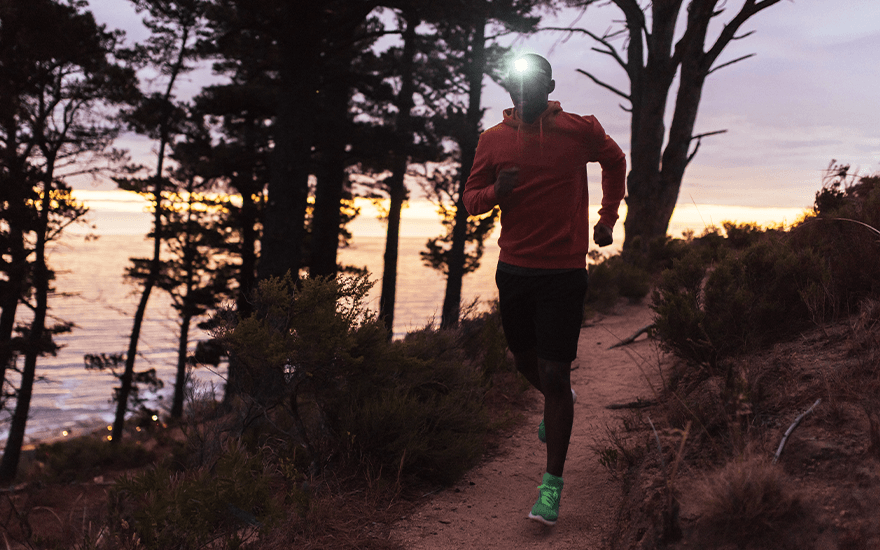 Man running through a forrest